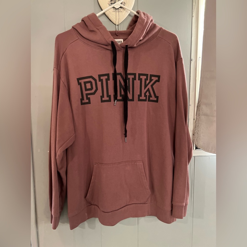 Victoria’s Secret PINK light maroon sweatshirt. Has a slight scoop neck.
